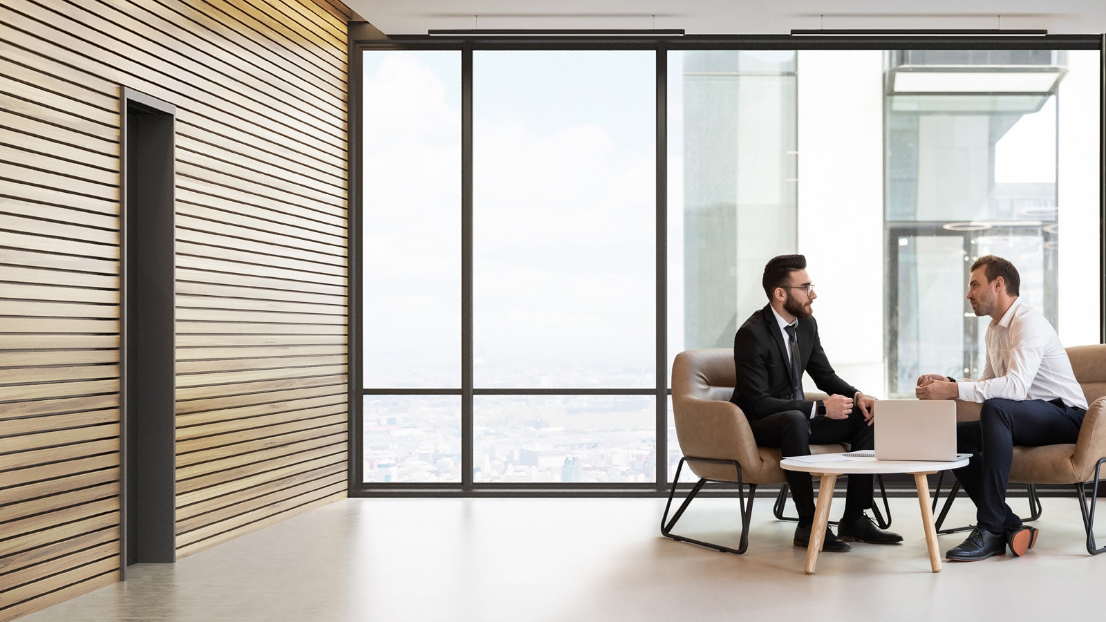 Businessmen discussing a deal in a modern office